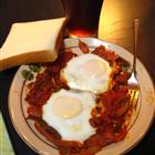 Chakchouka, a North African egg dish with tomatoes and peppers in olive oil