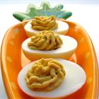 Bacon Cheddar Deviled Eggs with crispy bacon bits and sharp cheddar cheese
