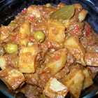 Cuban beef stew with tender meat and savory broth in a rustic bowl