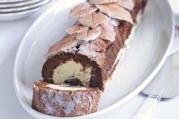Buche de Noel Christmas cake with dark chocolate and fluffy sponge roll