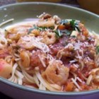 Seafood Cioppino with fresh bell peppers and chile in rich tomato broth