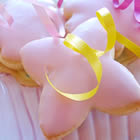 Sugar Cookie Cutouts with heart-shaped designs and smooth vanilla frosting